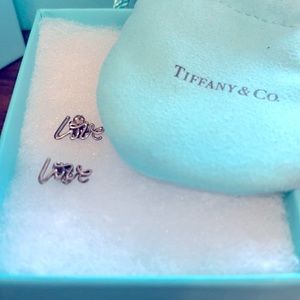 Tiffany & Co Paloma Picasso “Love” earrings.